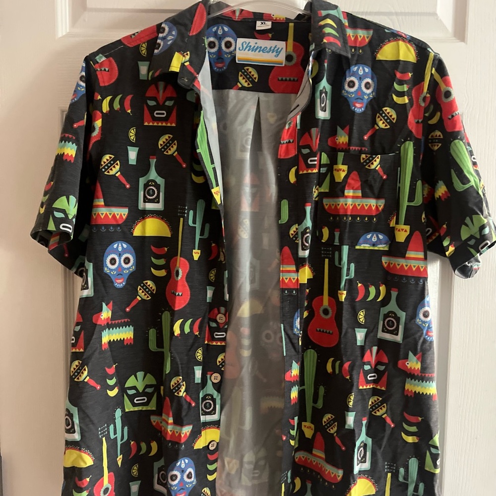 XL day of the dead men’s button up. The brand is Shinesly.